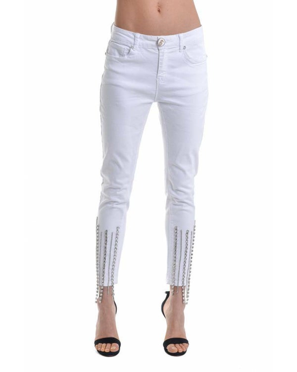 TIGHT JEANS WITH RHINESTONE CHAINS APPLIED TO THE BOTTOM