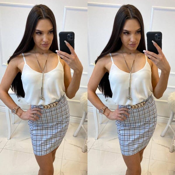 short skirt decorated with a gold chain