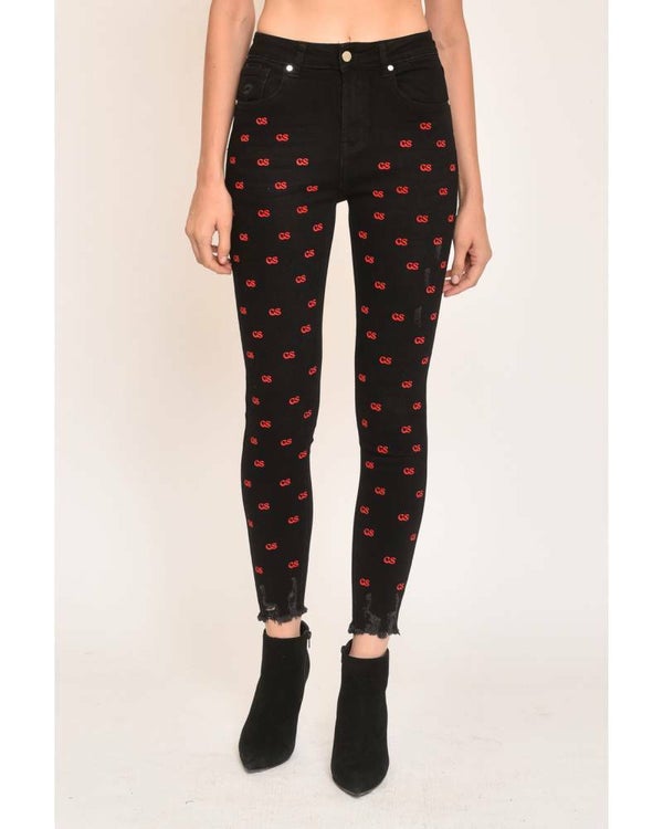 SKINNY JEANS WITH LOGOED DETAILS