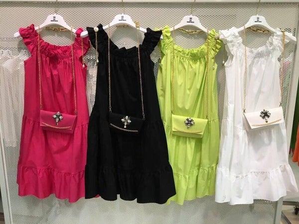 short dress with matching logo chain handbag