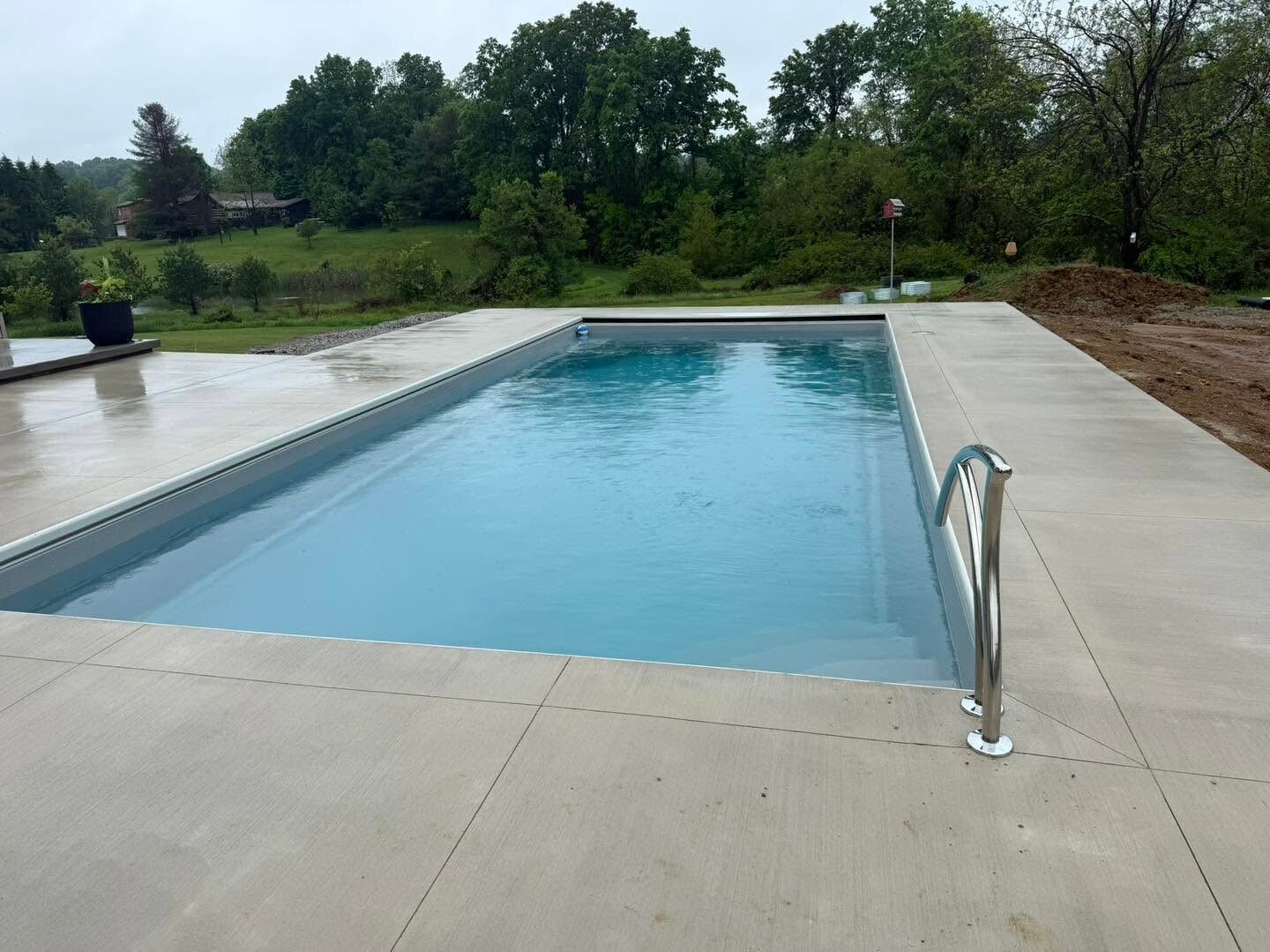 A rectangular pool and patio shared on our Facebook page.