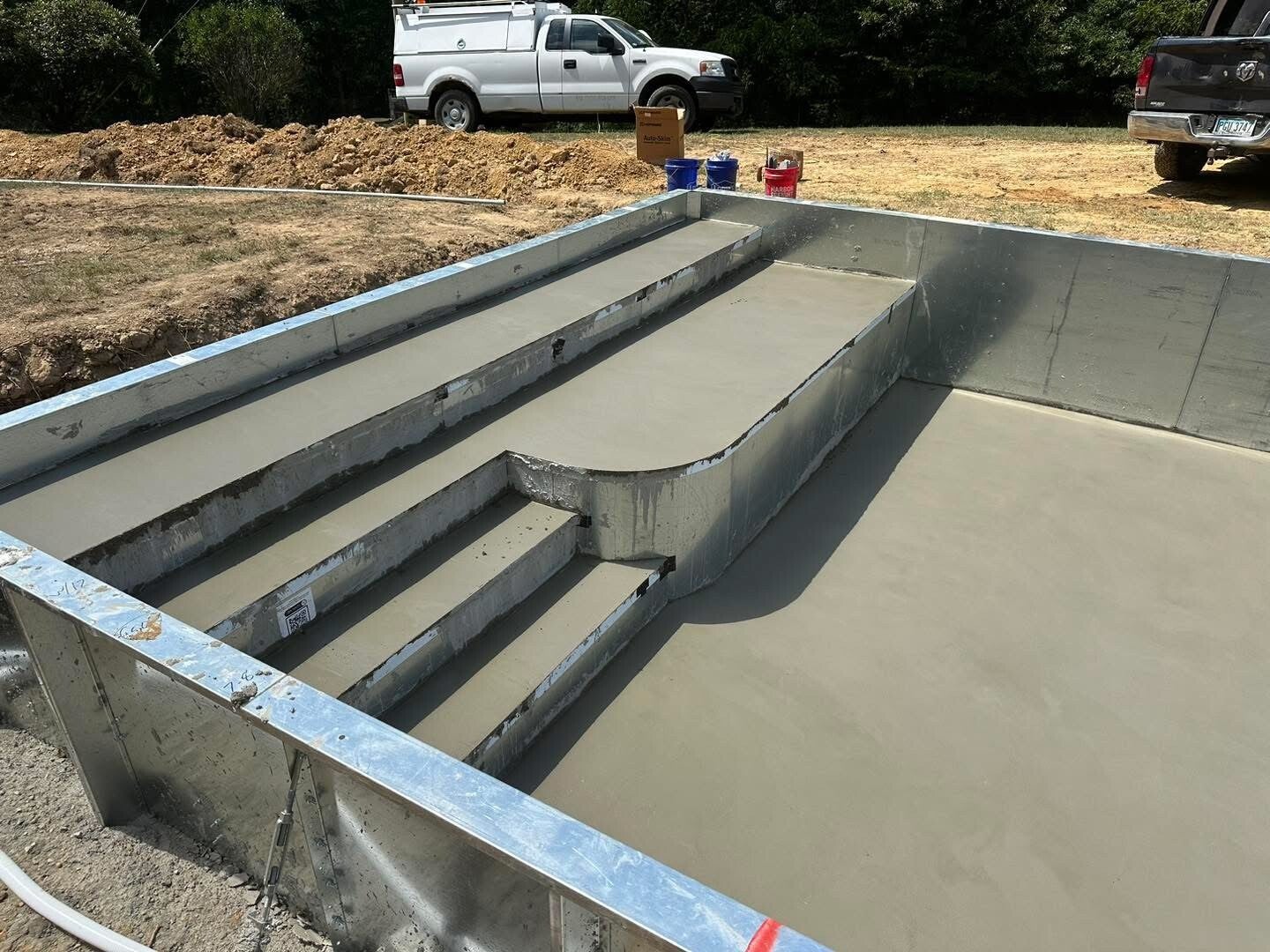 The steps and pool interior during construction. See the finished pool in this collection.