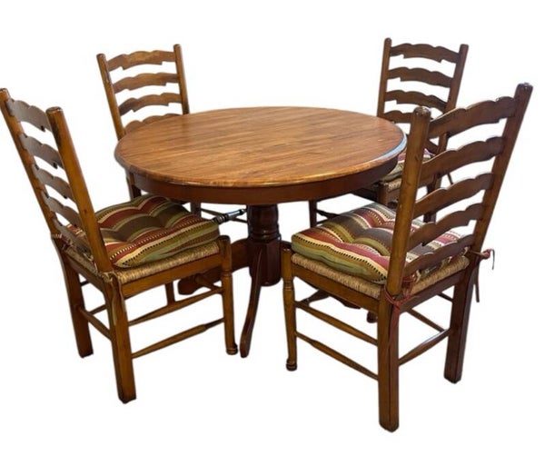 ROUND WOODEN TABLE WITH CANE BOTTOM CHAIRS