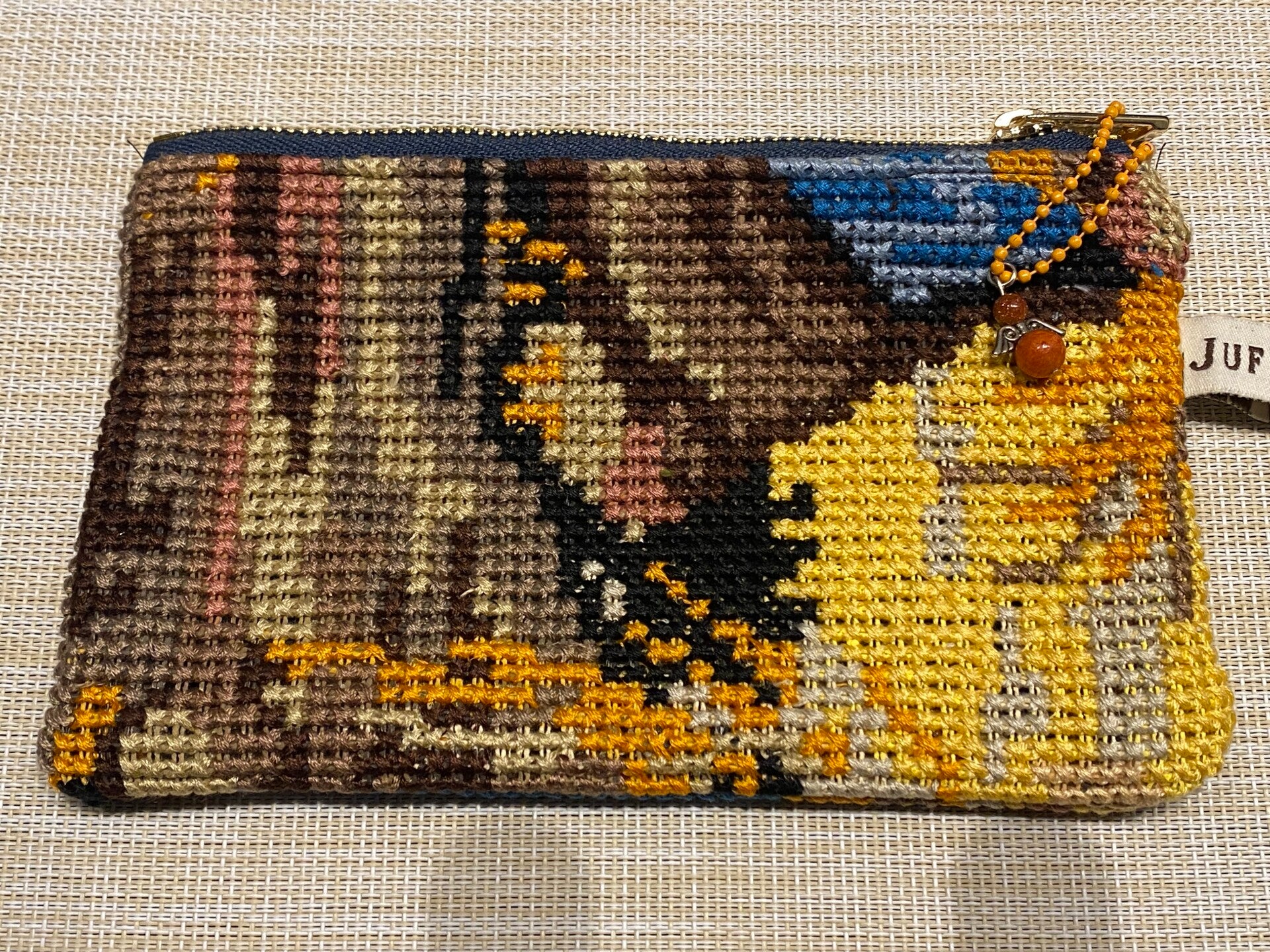 etui blauw/bruin/geel 12x19 cm