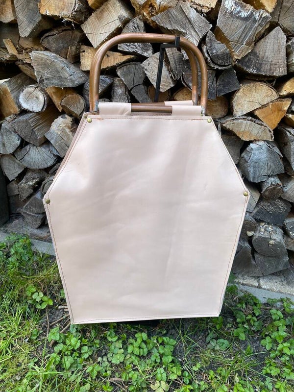 Shopper met messing handvatten.