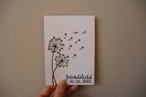 Kaart 'gecondoleerd, heel veel sterkte'