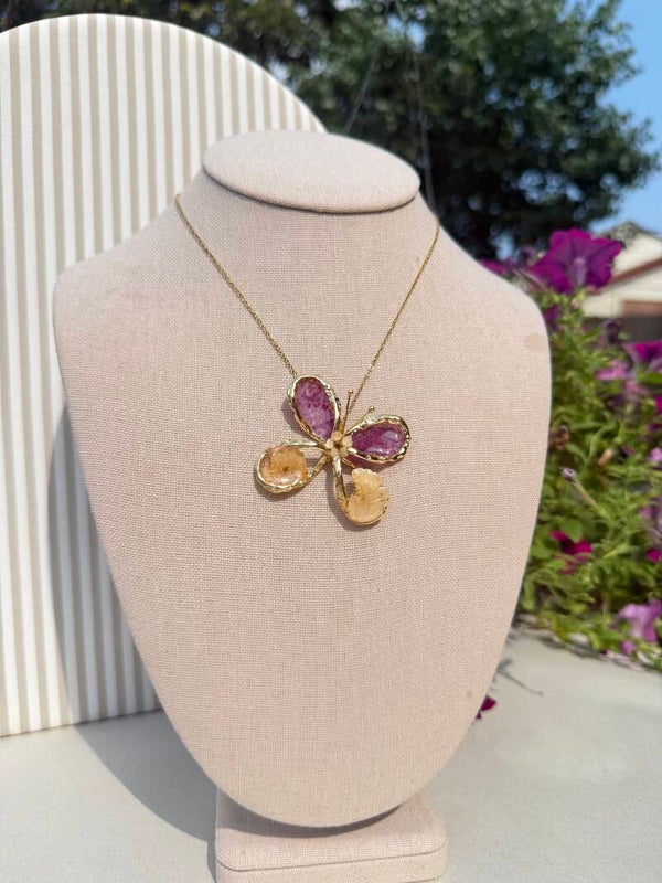 Gold & purple butterfly pendant necklace with purple & gold stone wings