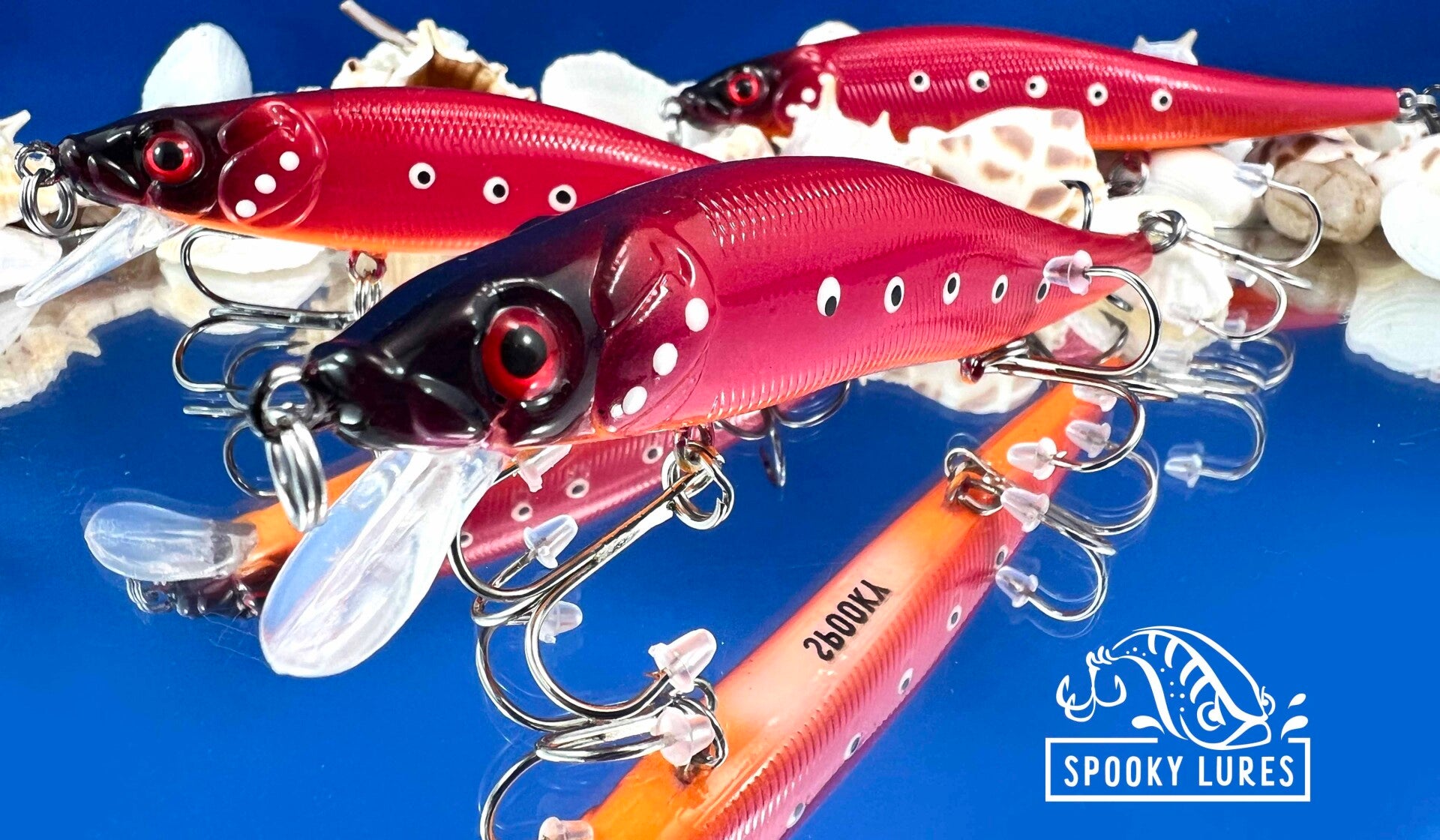 110 - Red with white and orange belly. white and black body spots