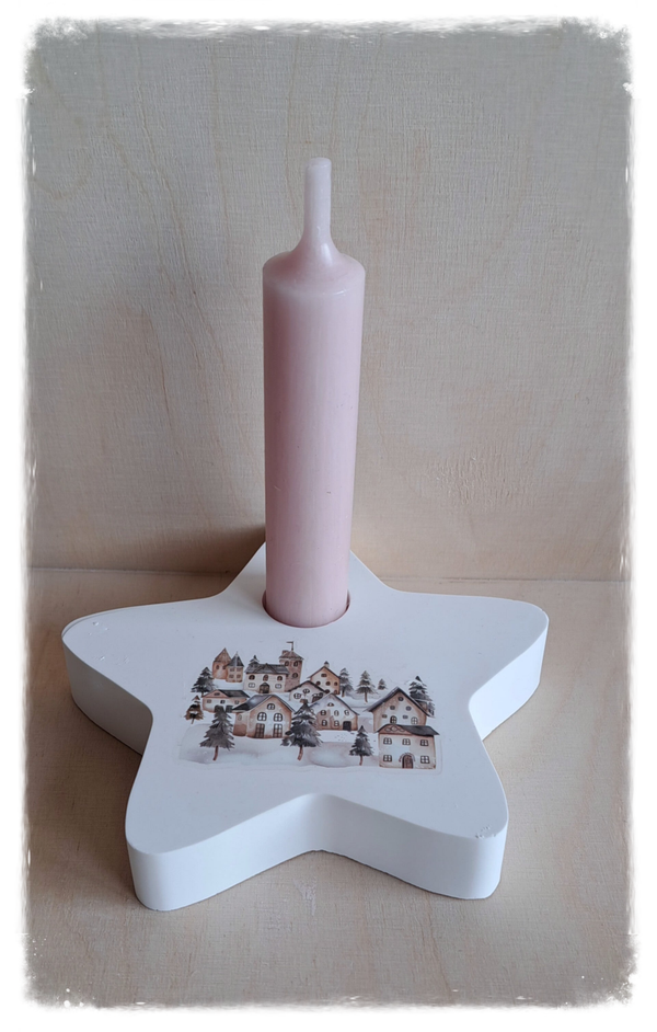 Stern mit Winterdorf und Kerze