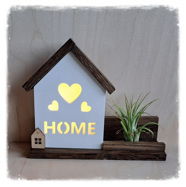 Haus home mit pflänzchen