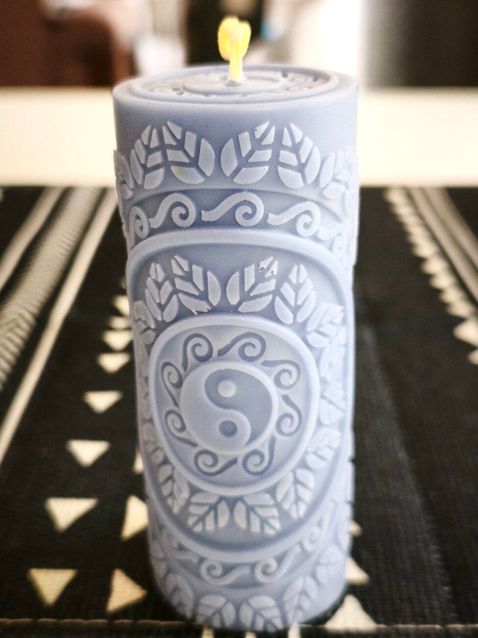 Vela con relieve de Taiji Yin-Yang