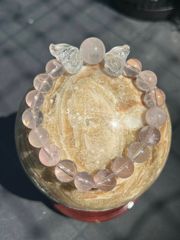 Vleugel armband rozenkwarts en bergkristal