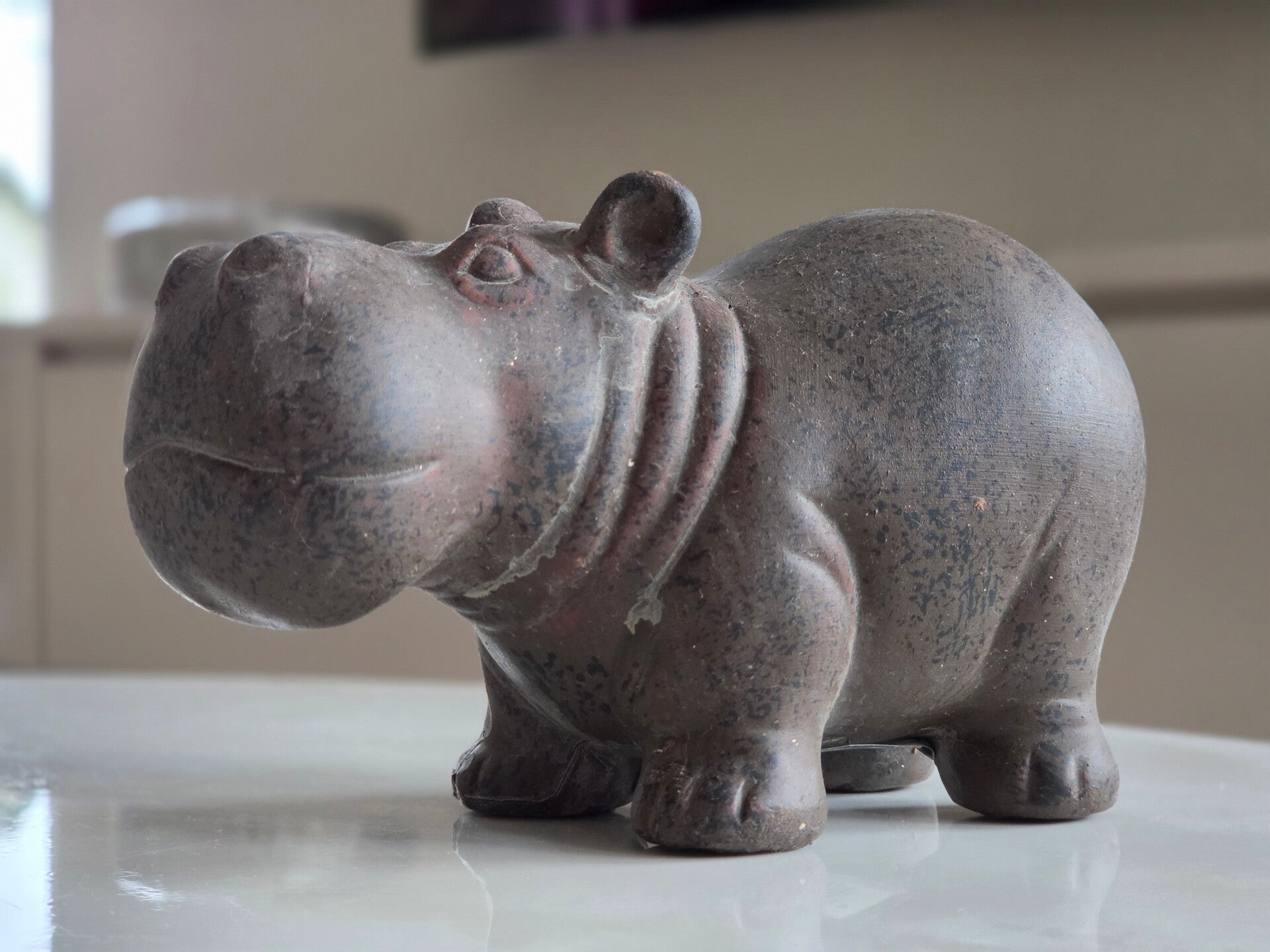 beeld Mafuta nijlpaard bruin