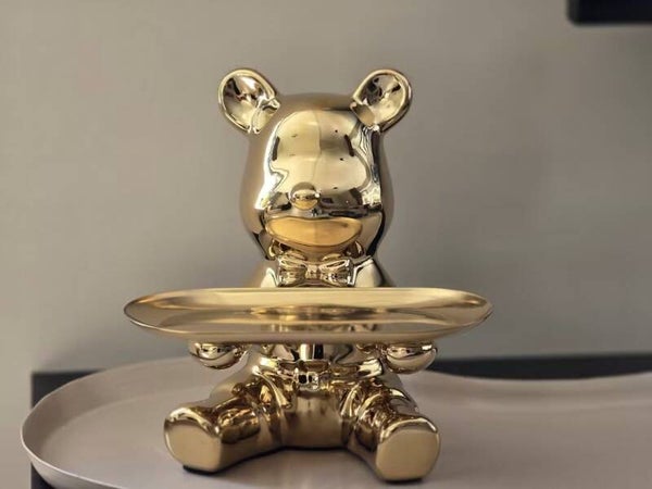 Gouden beer met tray