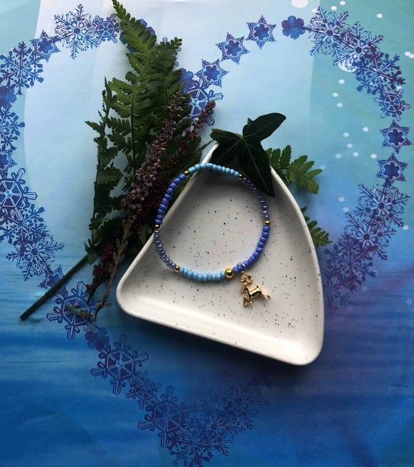 Armband in blauw en goudkleur