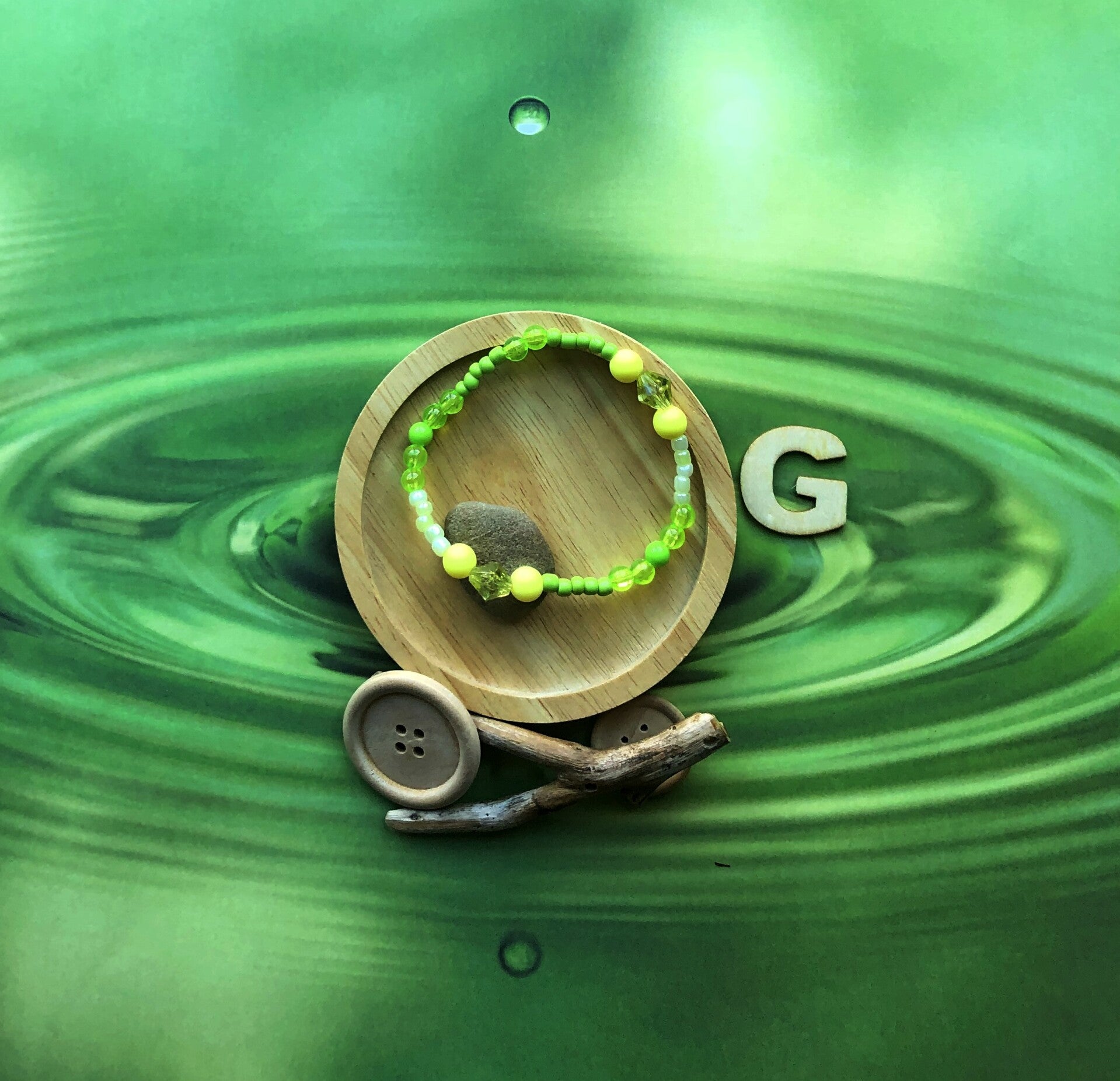 Armbandje in groen en geel