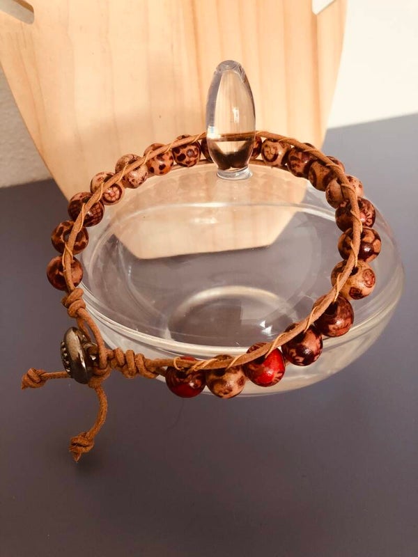 Geknoopte armband met houten kralen