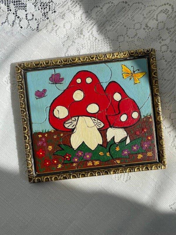 Houten handgemaakt puzzeltje met paddenstoelen