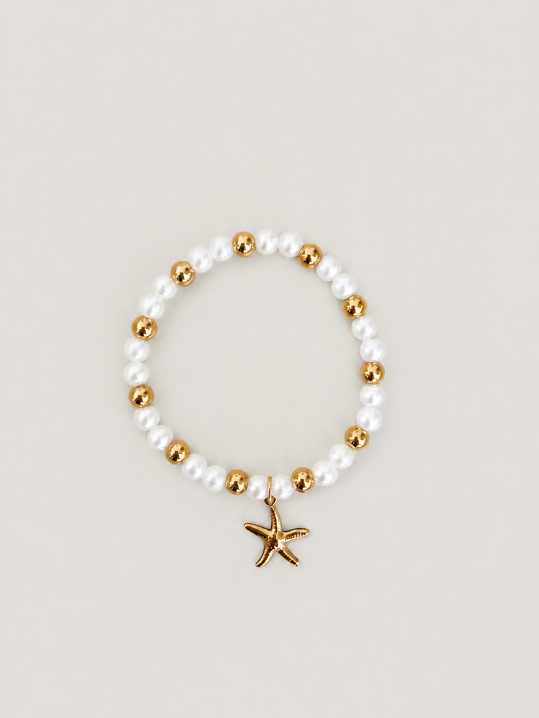 Starfish & Pearl armband - stainless steel - goudkleurig