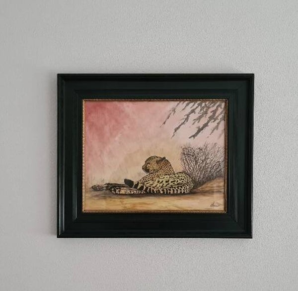 Cheetah onder struiken