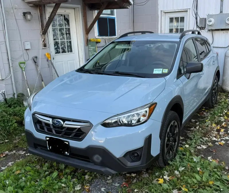 picture of 2023 Subaru Crosstrek parked in our driveway