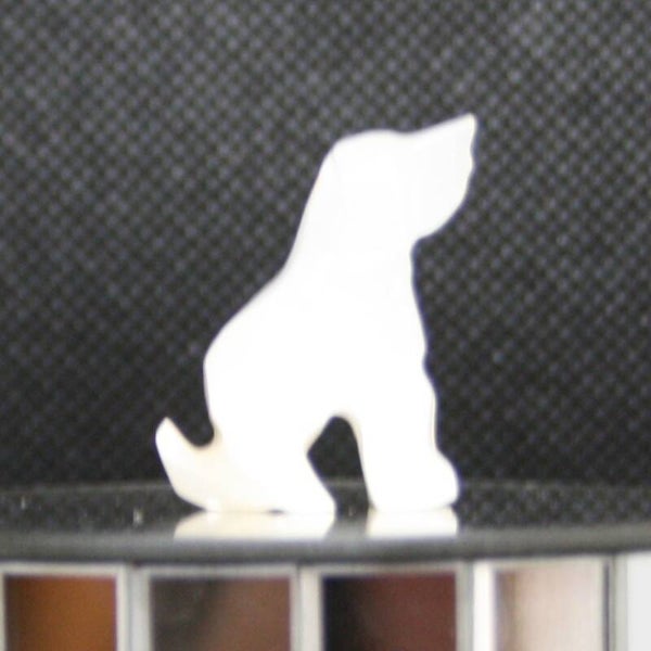 Hond zittend s (a)