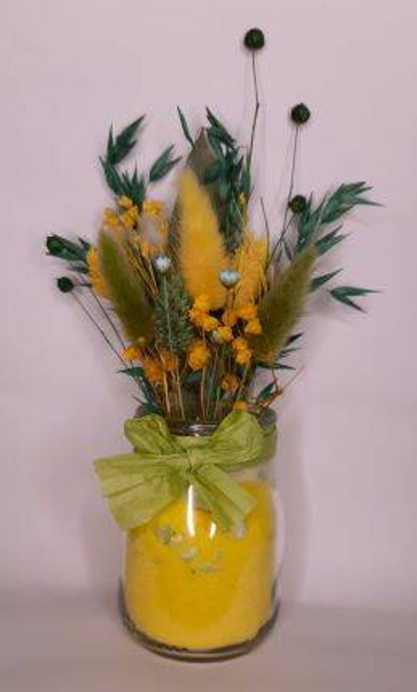 Glas mit Blumen/Blättern
