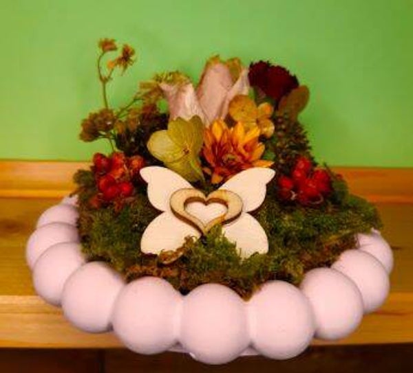 Dekoteller mit Trockenblumen