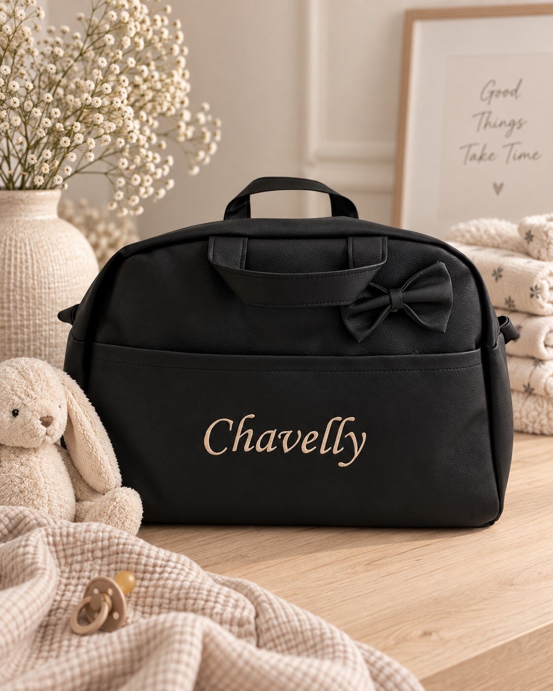 Luiertas met naam geborduurd