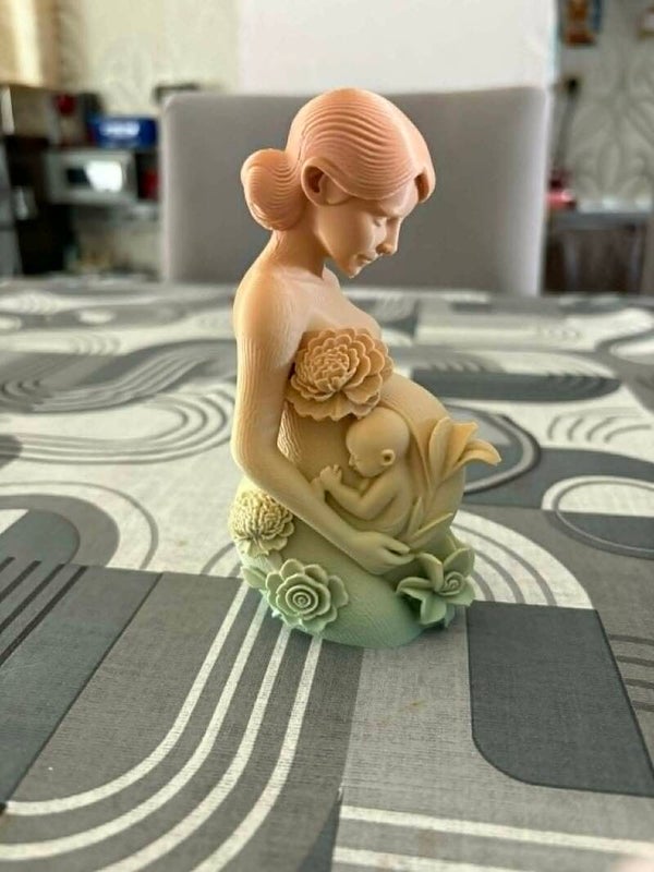 zwangere vrouw met baby