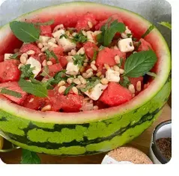 Gegrilde watermeloen met salade | feta | nootjes à € 19,50