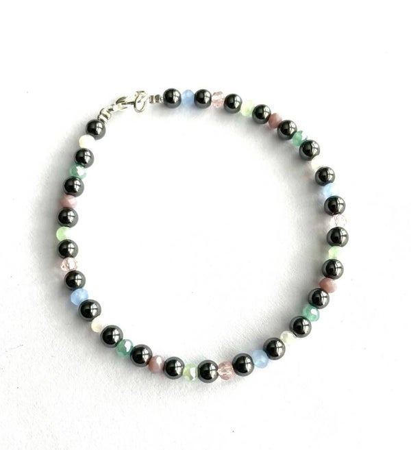 Hematiet en facet glaskralen