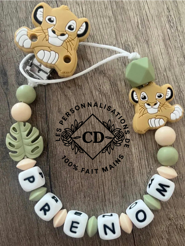 Attache tétine roi lion