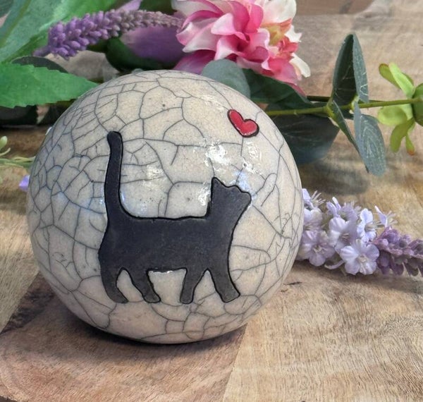Kattenurn kat lopend rood hartje
