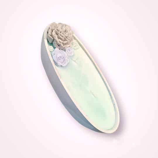 Kaars boot groen grijs beton