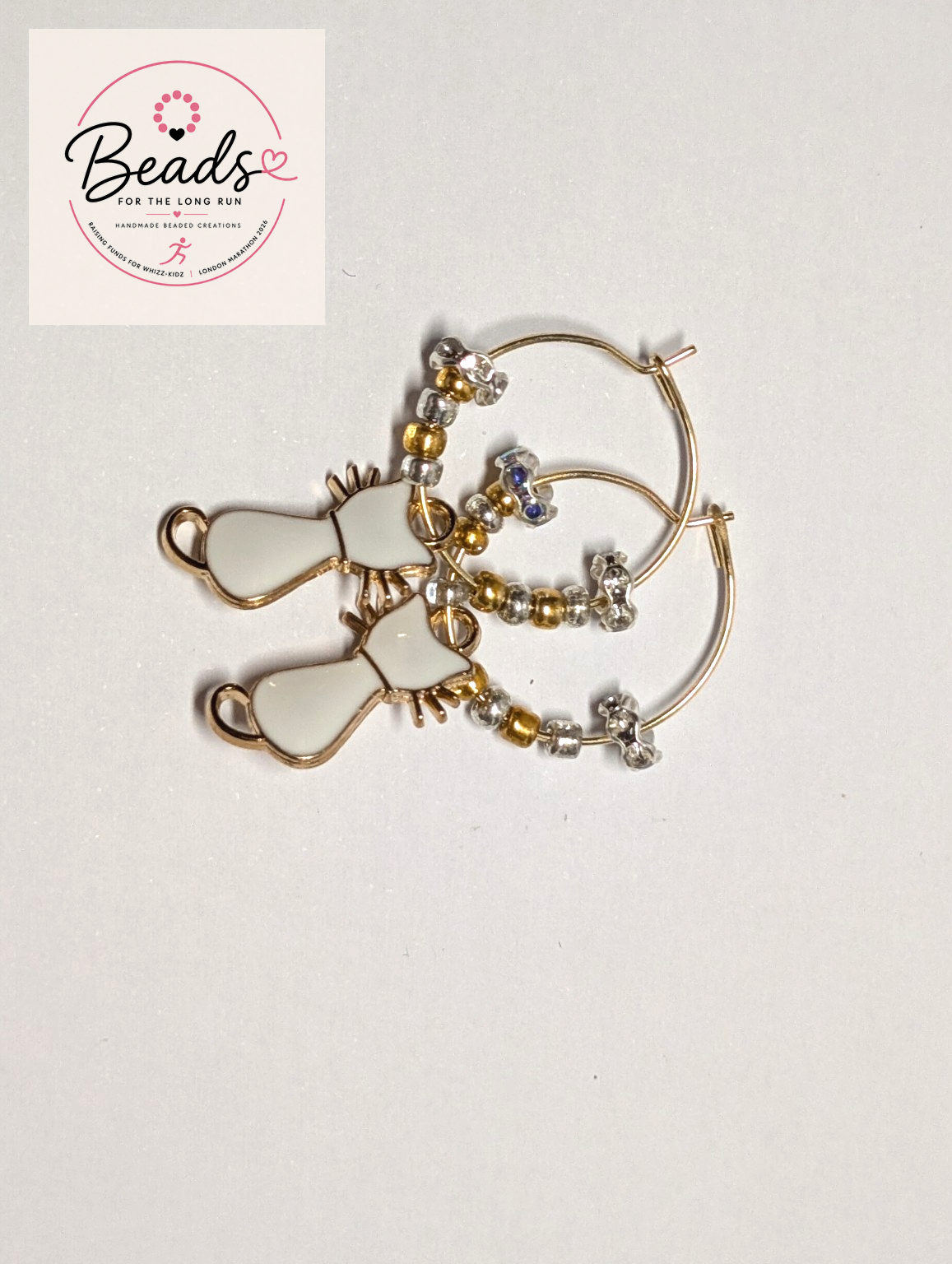 Animal charm hoop earings
