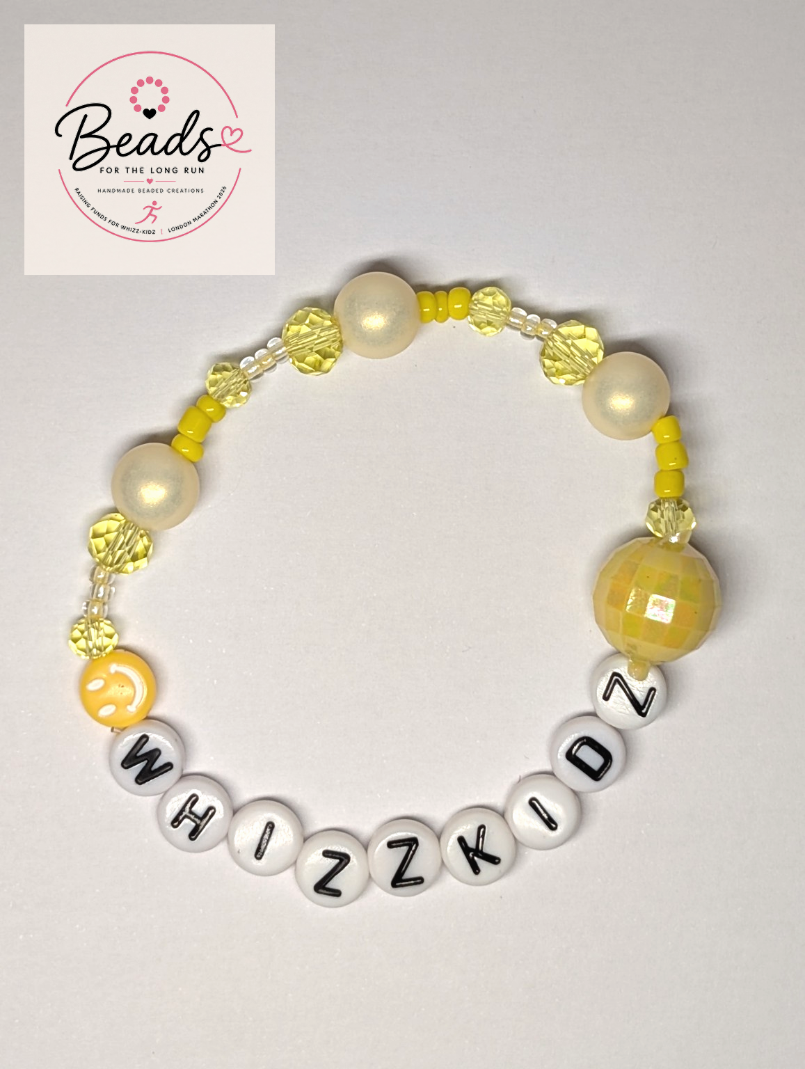 Handmade Whizz Kidz charity bracelet