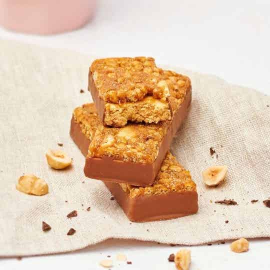 Reep Chocolade hazelnoot crunch, verpakt per 7