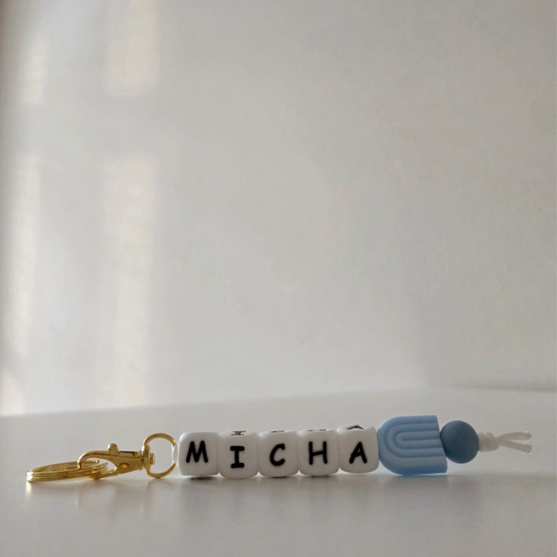 Tassenhanger | blauw regenboogje
