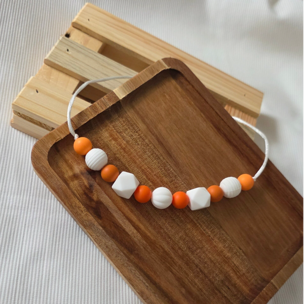 Oranje kralenketting