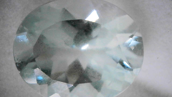 Blue oval-cut aquamarine