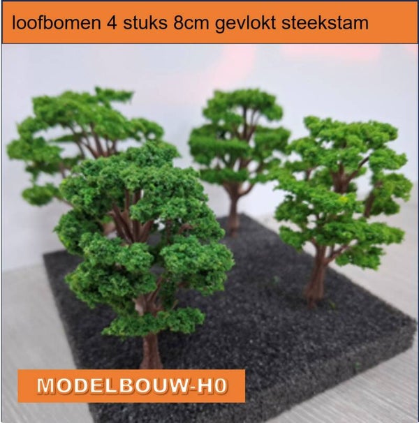 loofbomen 4 stuks  8 cm hoog gevlokt met steekstam