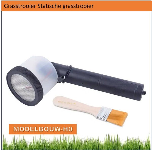 Elektrostatische Grasstrooier met statisch gras en batterijen.