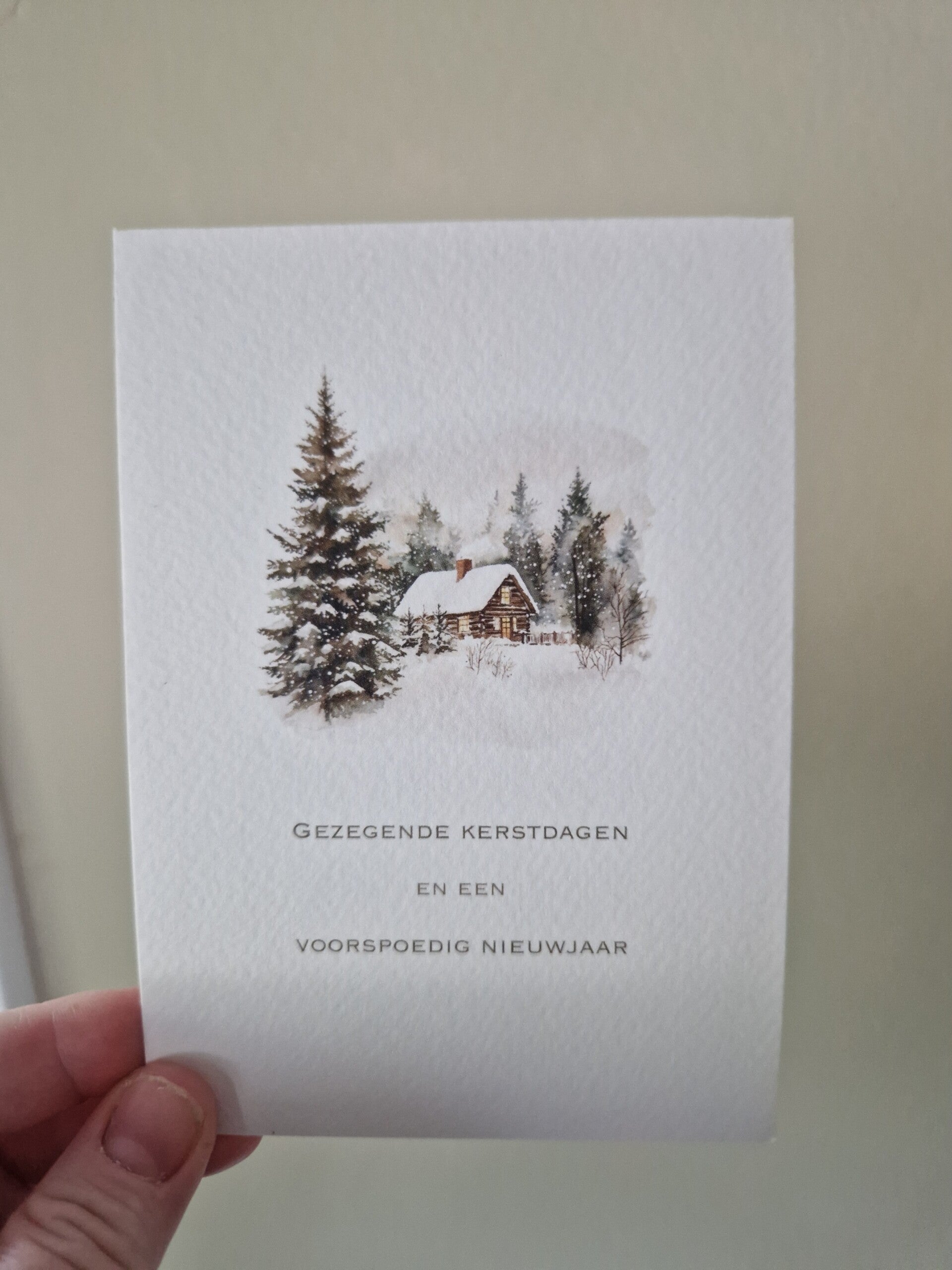 Kerstkaart huisje in sneeuw