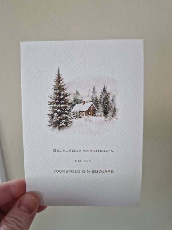 Kerstkaart huisje in sneeuw