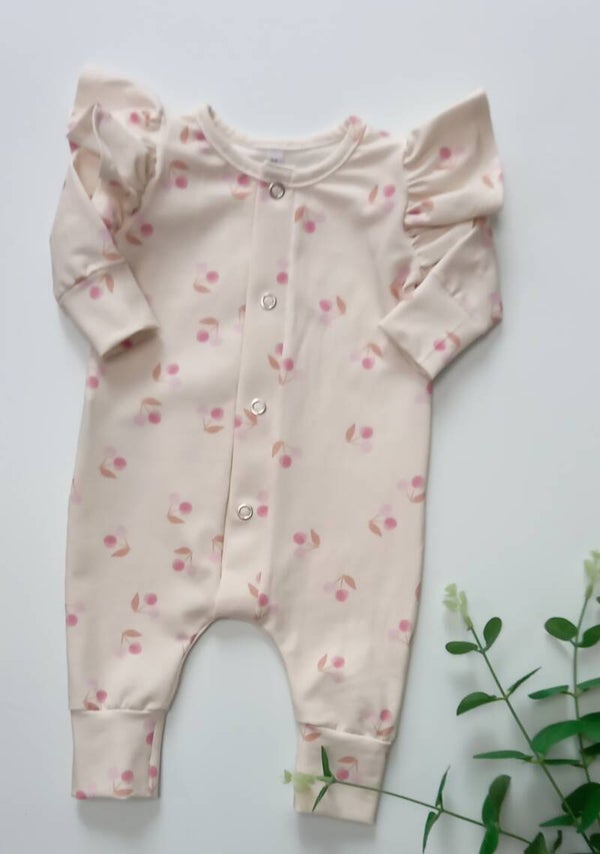 Kruippakje ruffle 'kersen' maat 62