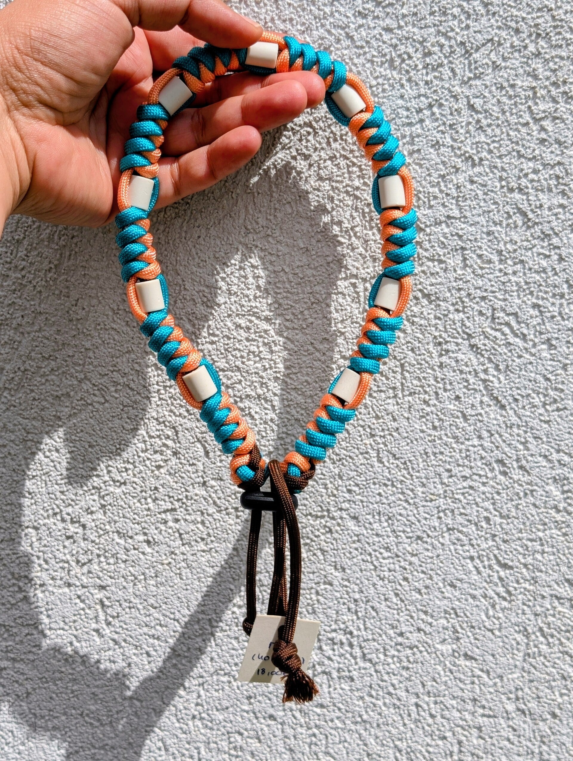 M Collier anti-tiques en céramique EM