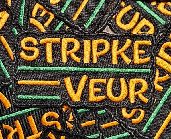 KR070 Embleem kruikenstad stripke veur