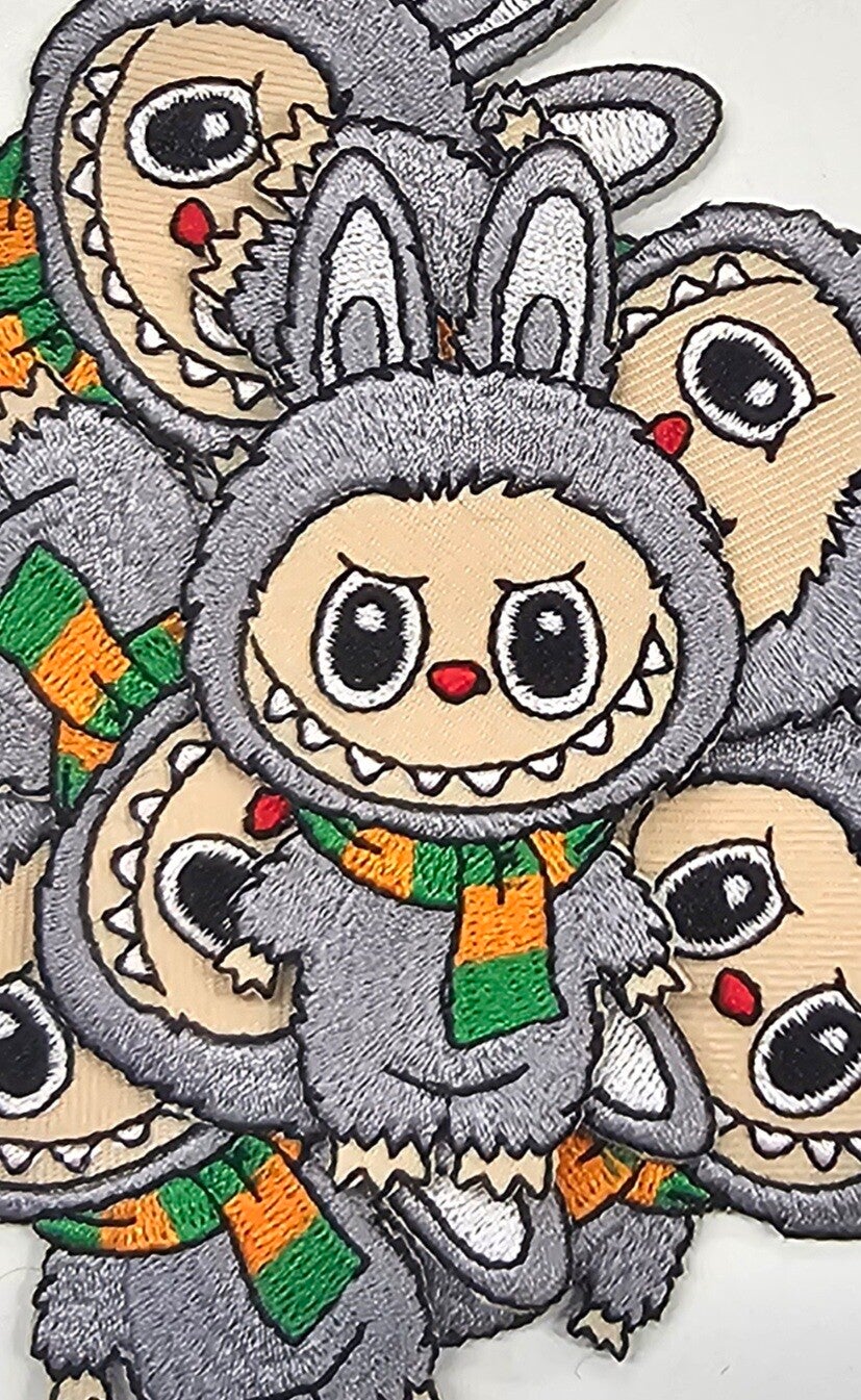 Embleem Labubu kruikenstad