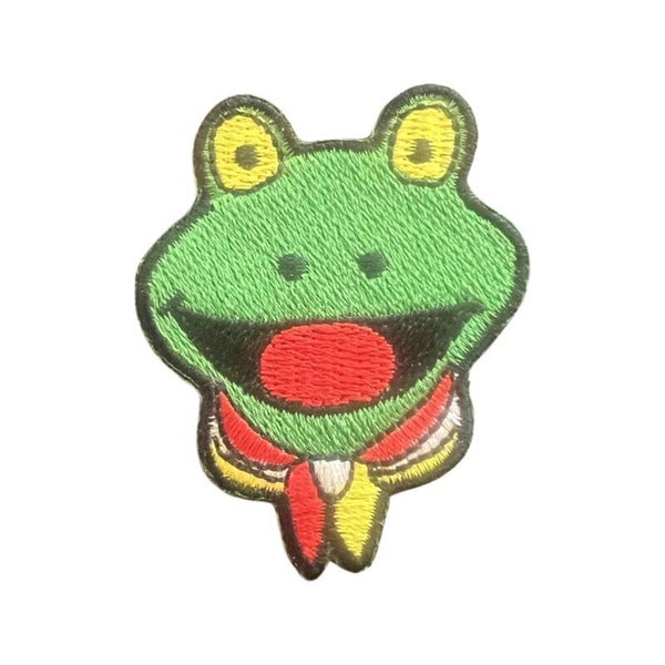 Kikkerkop met sjaaltje.